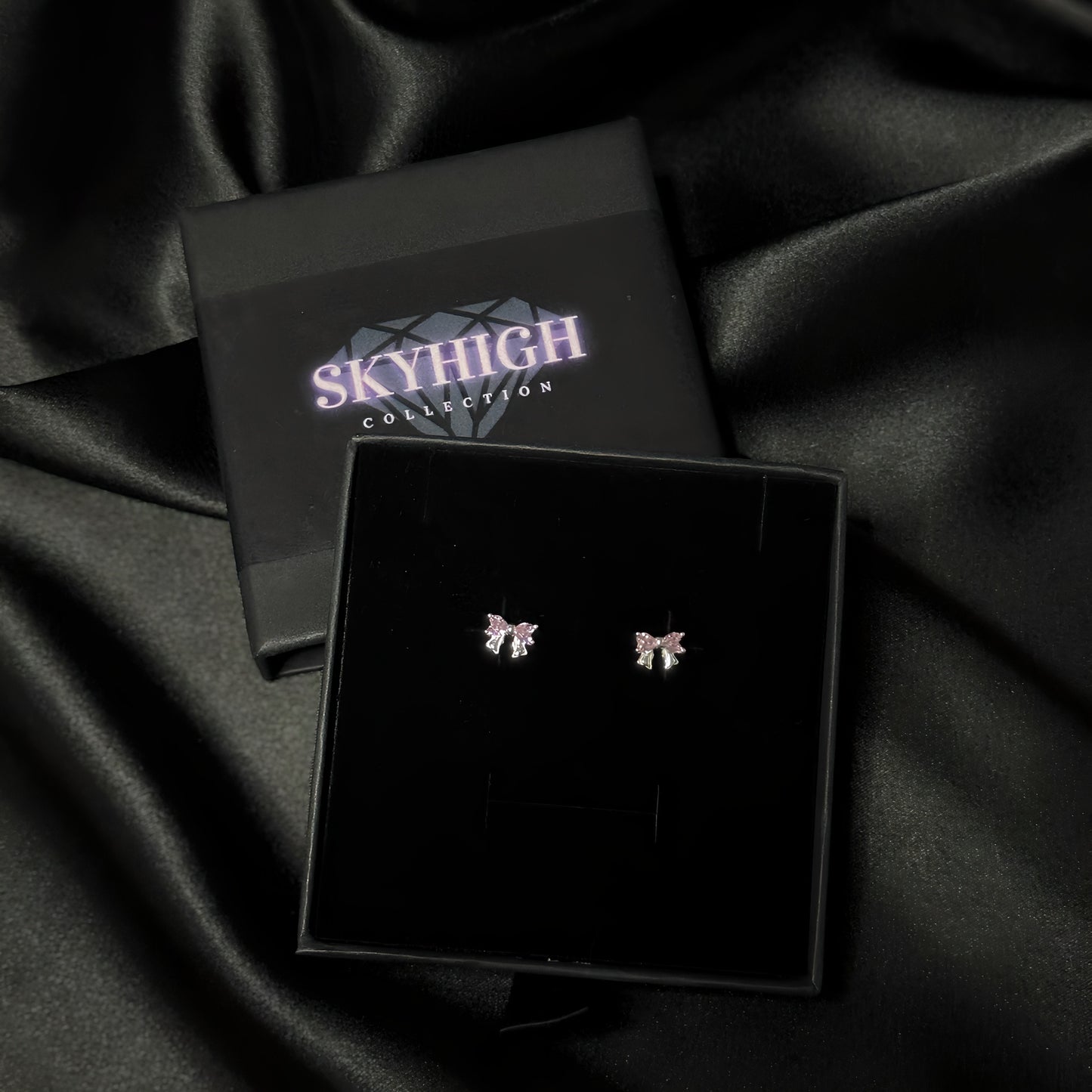 Обеци с розова панделка